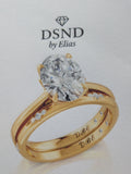 14 karat yellow gold engagement ring and wedding band bridal set with Lab Grown Diamond accents.