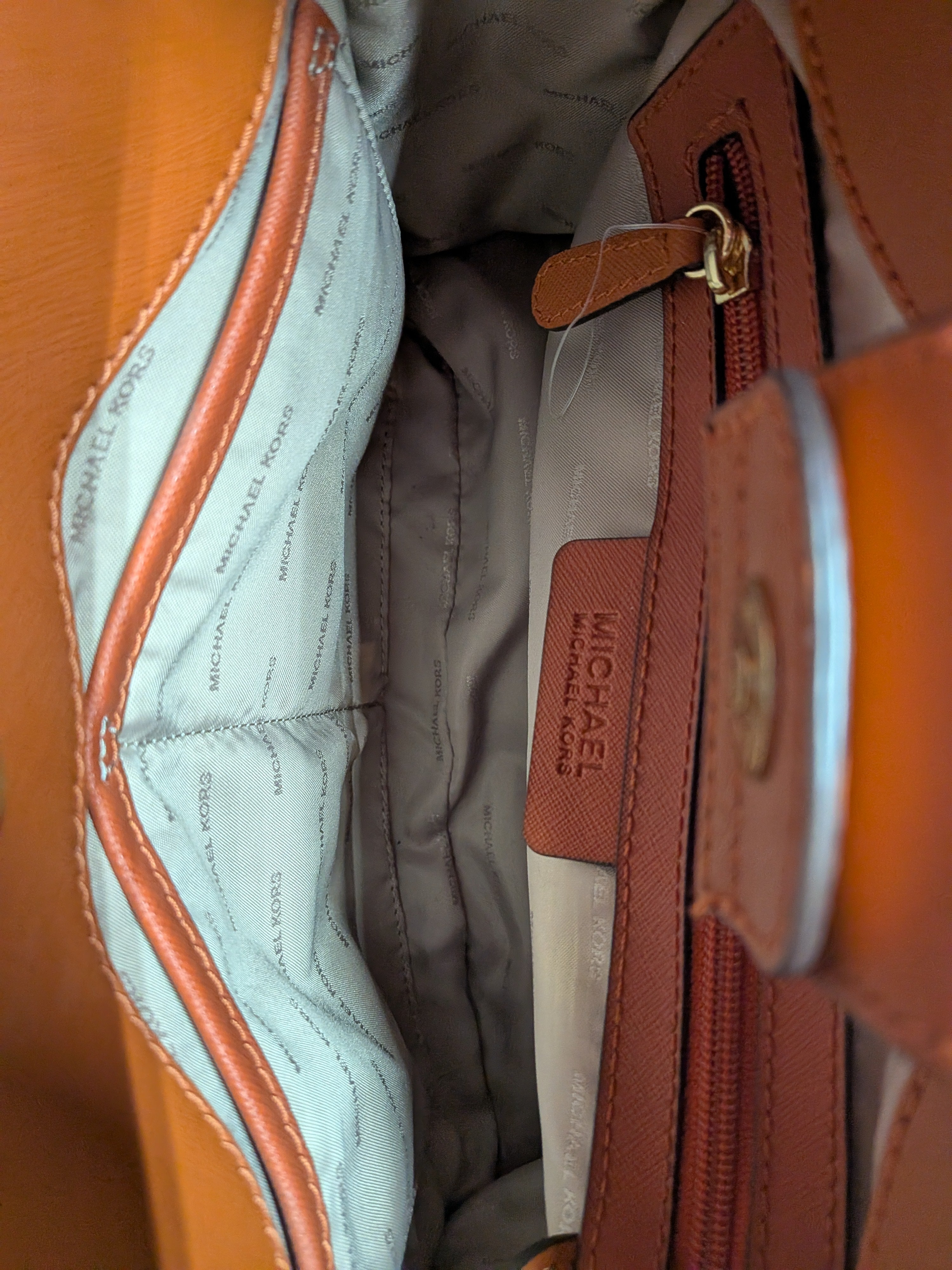 Michael Kors Hamilton Orange like brand new! $222