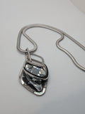 Rhinestones and Silver/ Alloy necklace $55