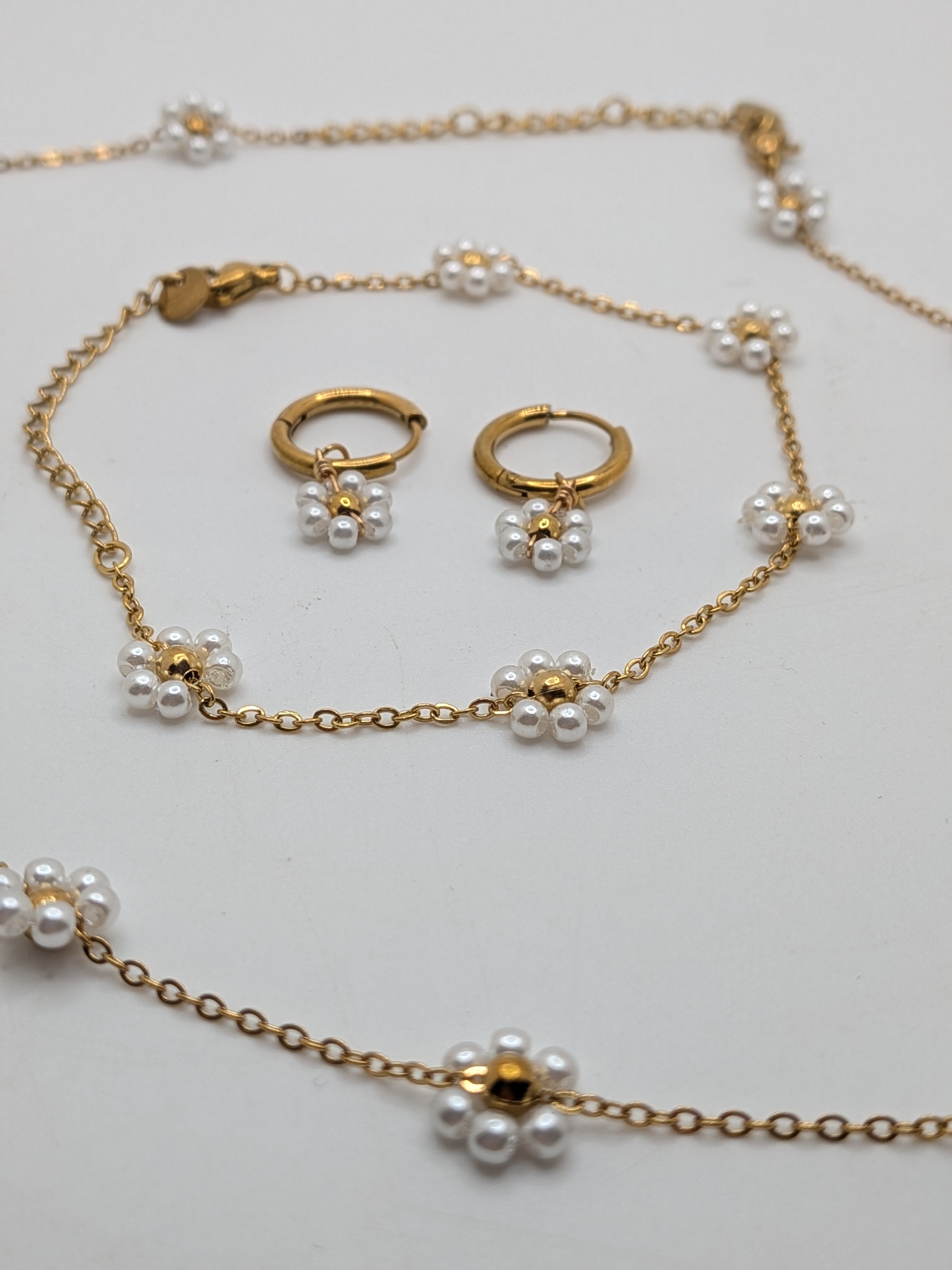 Pearl Bloom Set $100 Stainless Steel with gold plated.