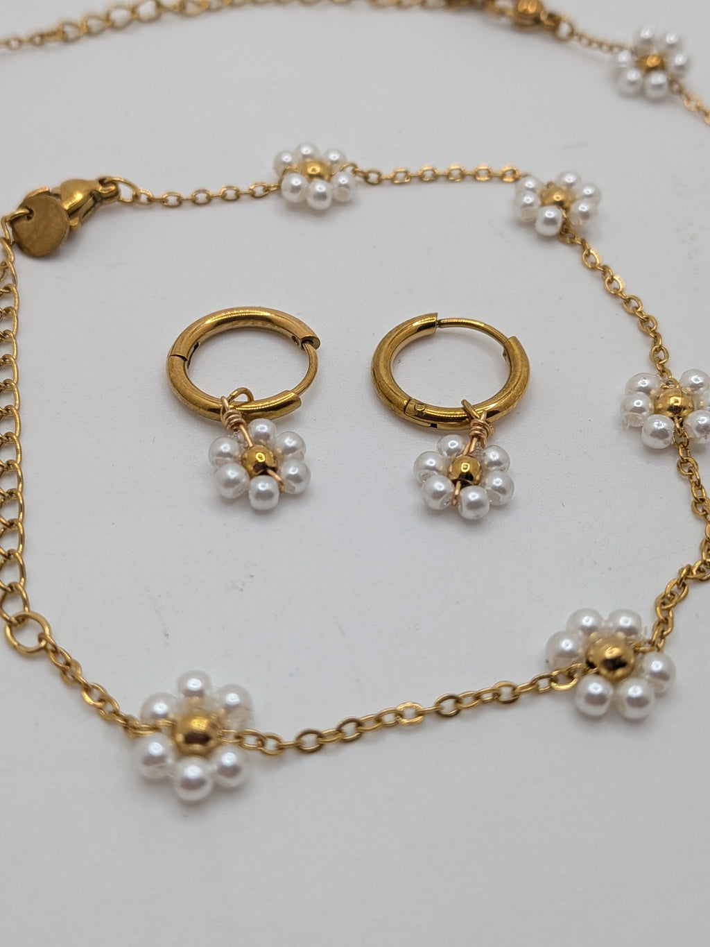 Pearl Bloom Set $100 Stainless Steel with gold plated.