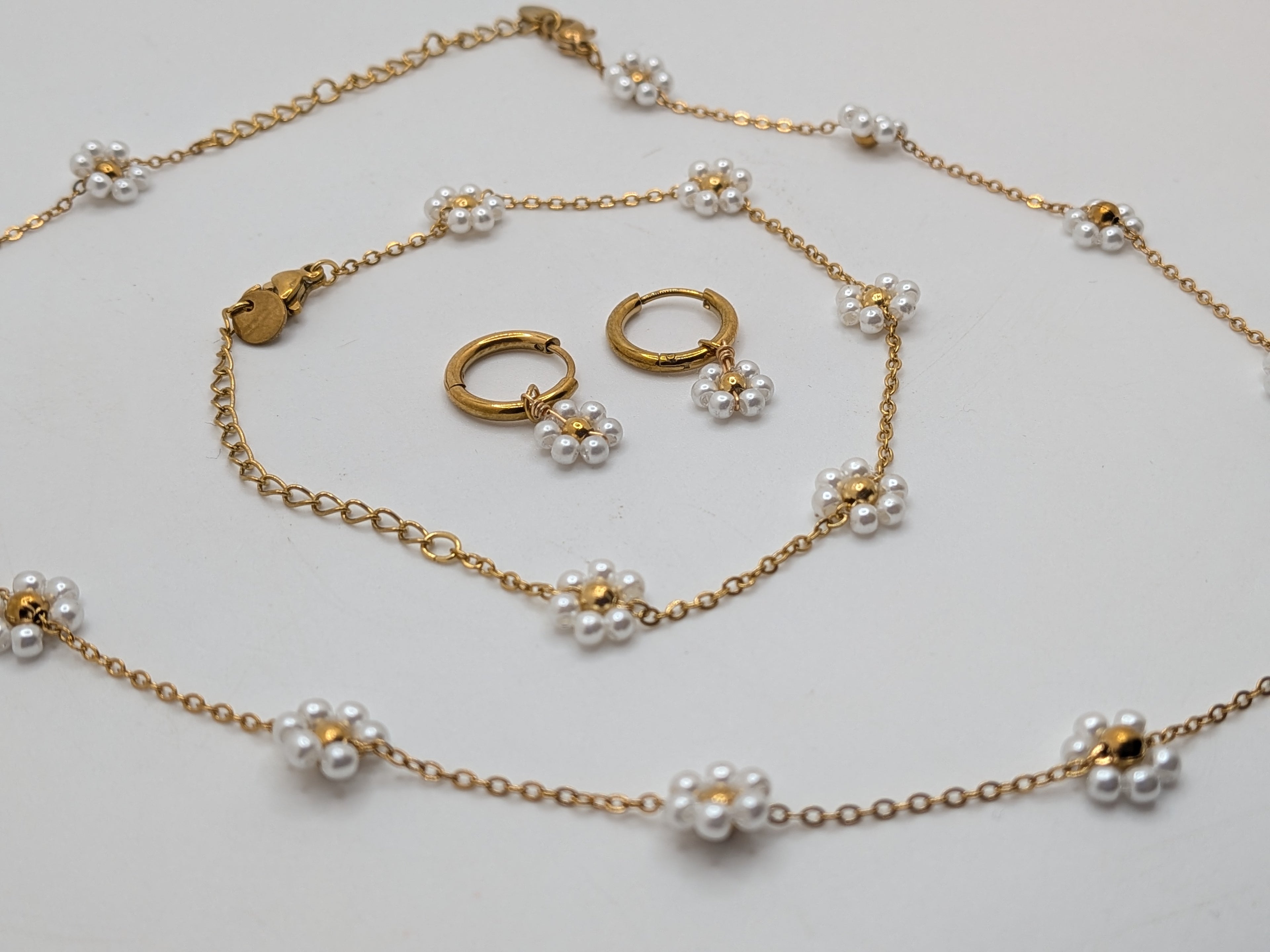 Pearl Bloom Set $100 Stainless Steel with gold plated.