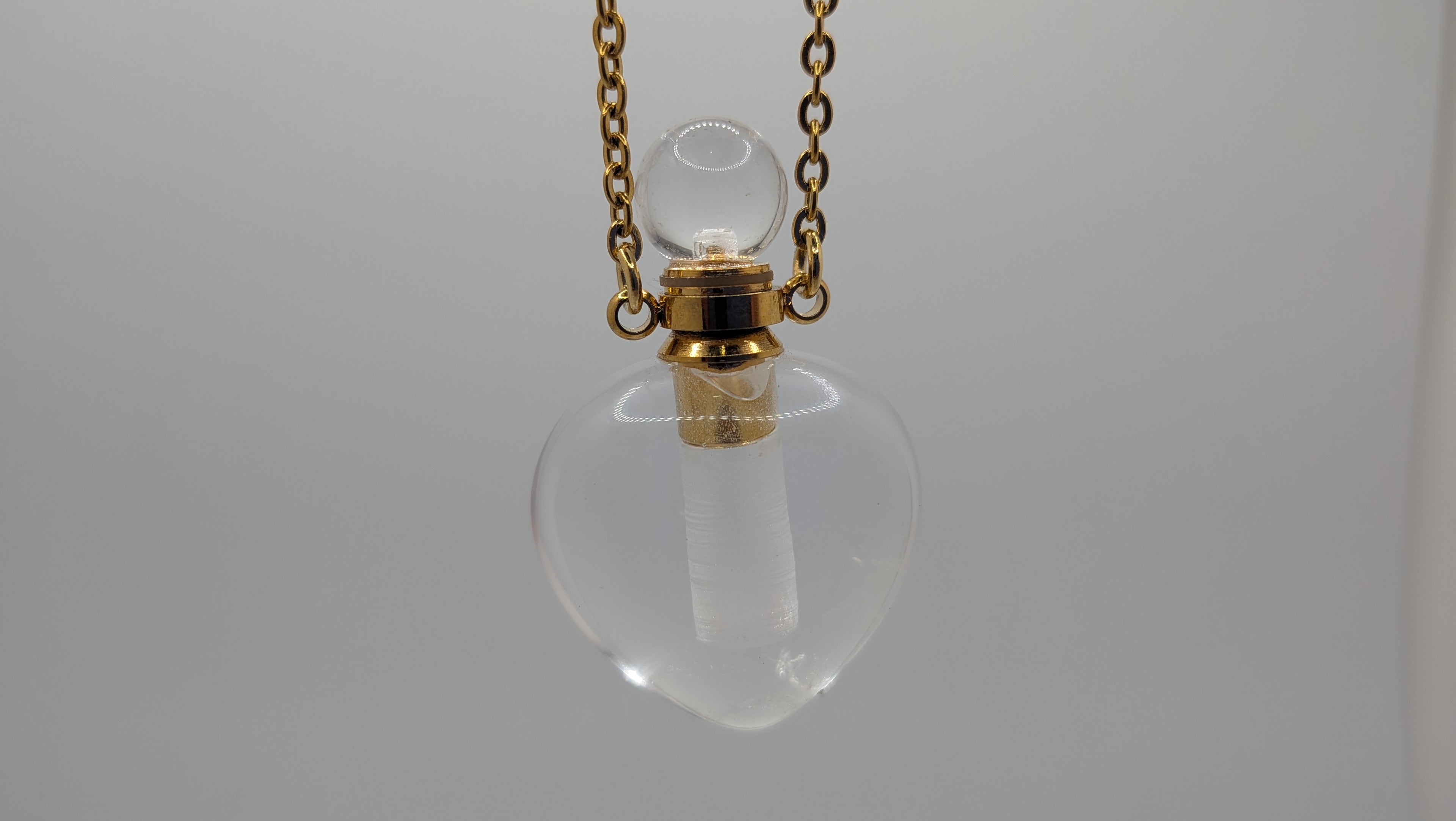 Kulli White Quartz Heart Perfume Necklace