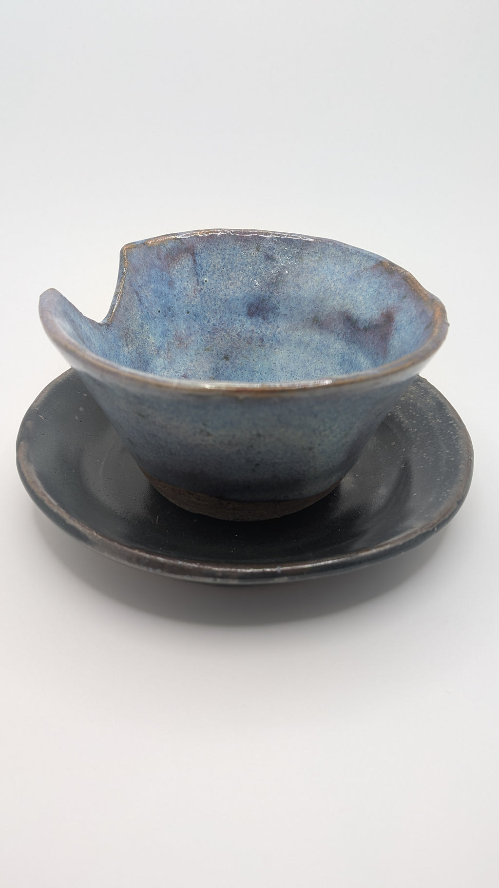 Chipped Tea Cup and Plate