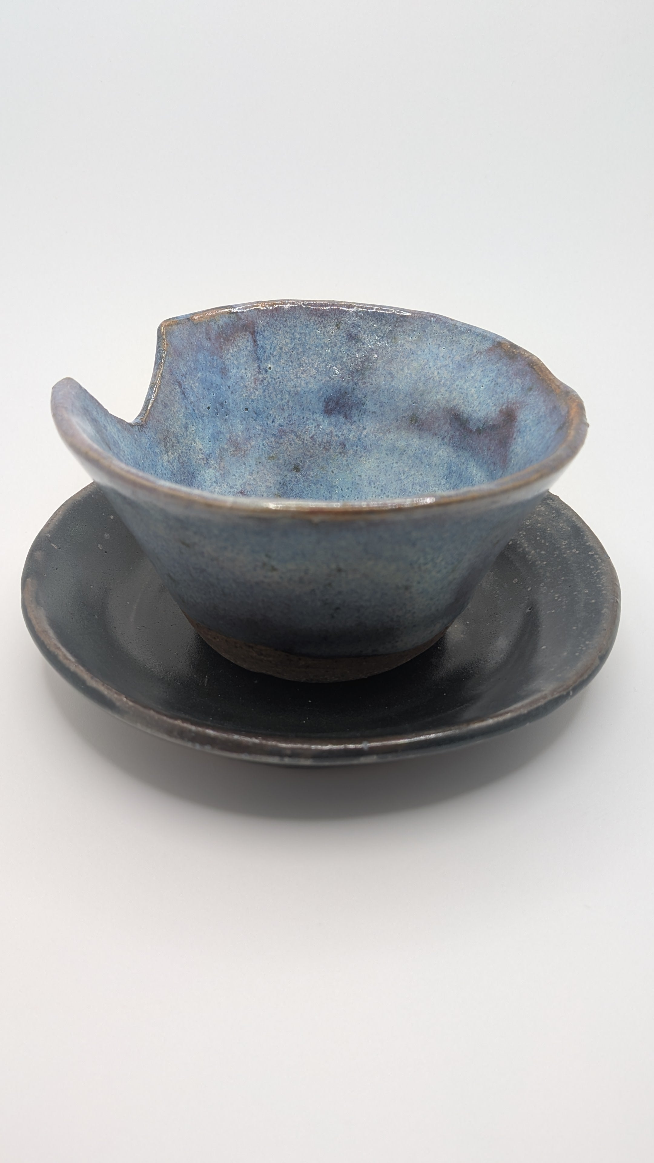 Chipped Tea Cup and Plate