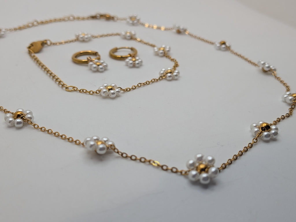 Pearl Bloom Set $100 Stainless Steel with gold plated.