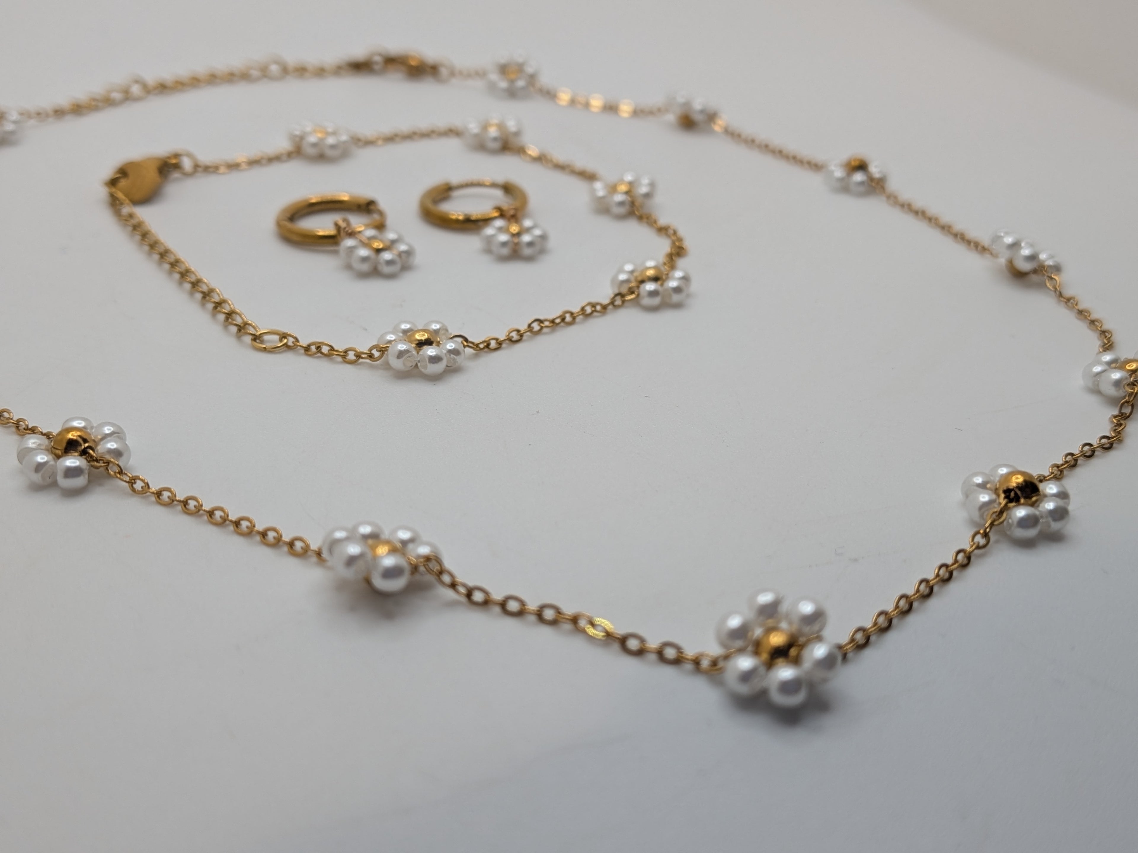 Pearl Bloom Set $100 Stainless Steel with gold plated.