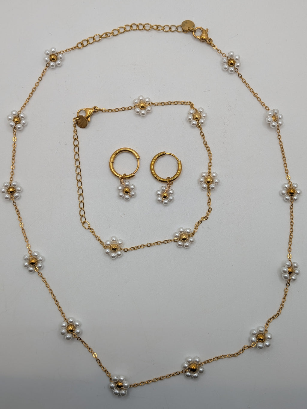 Pearl Bloom Set $100 Stainless Steel with gold plated.