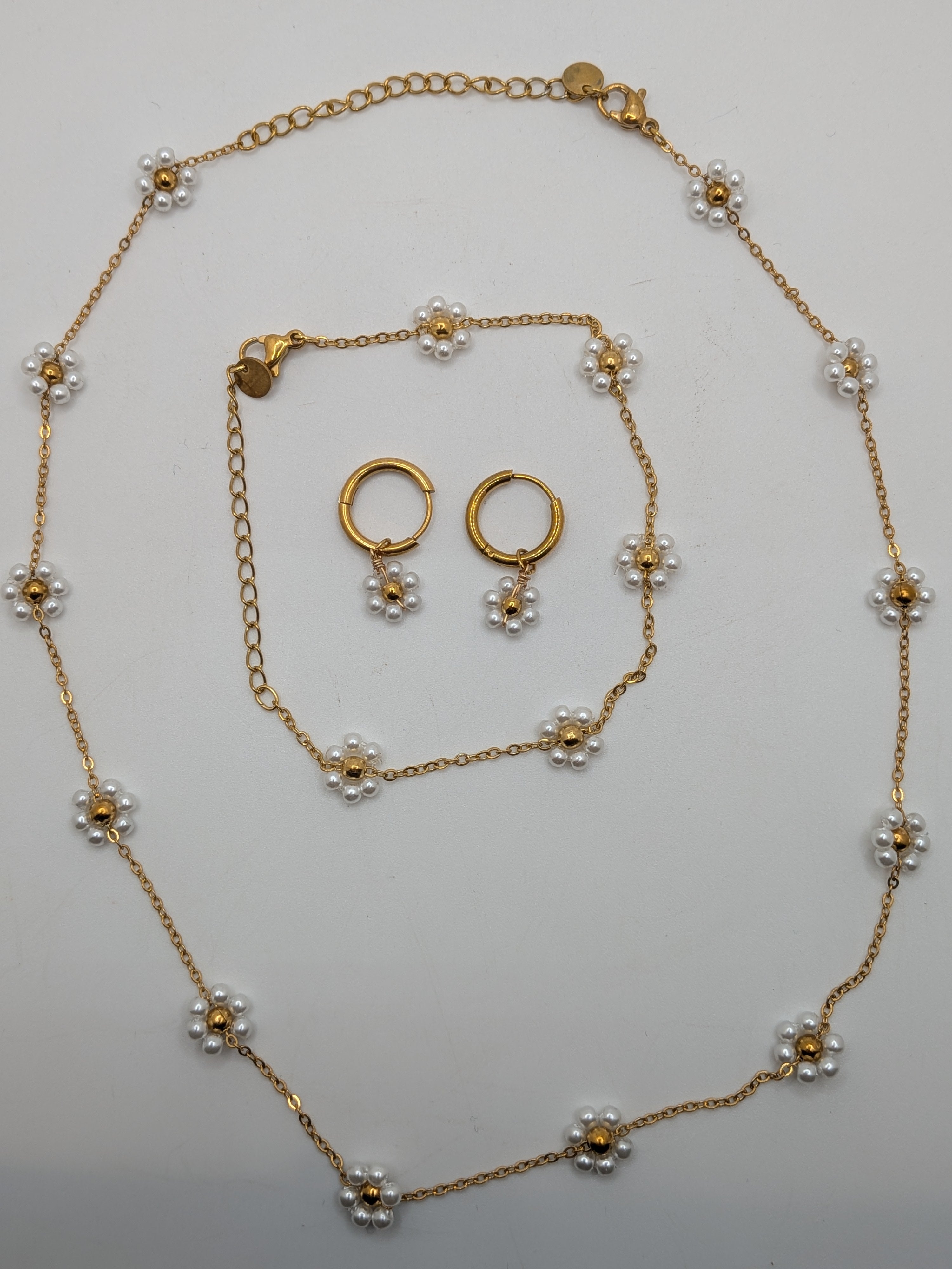 Pearl Bloom Set $100 Stainless Steel with gold plated.