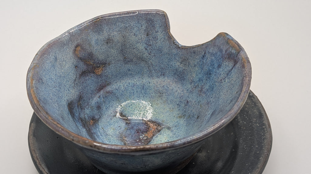 Chipped Tea Cup and Plate