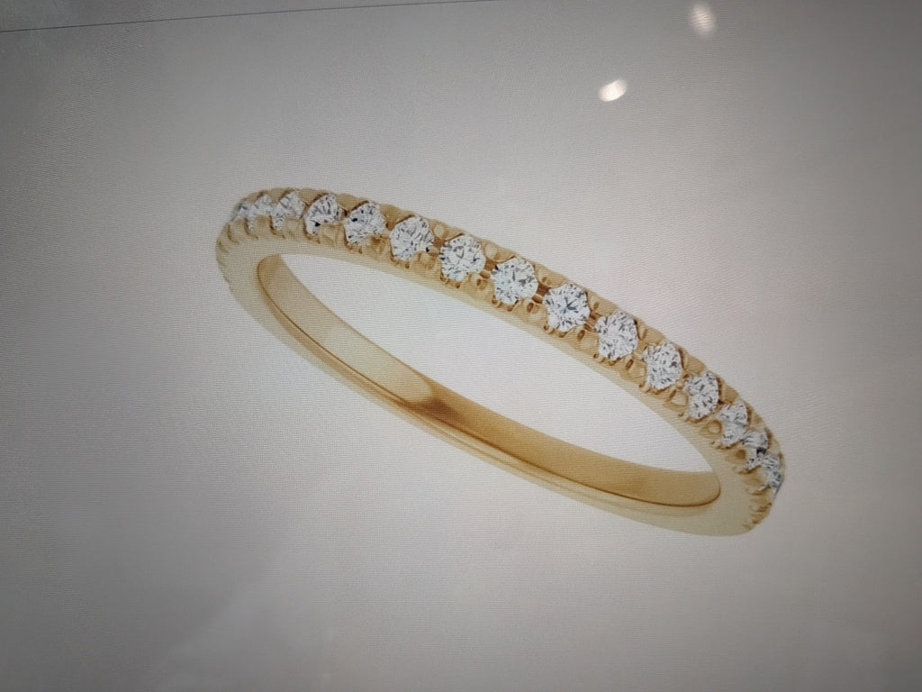 14 karat yellow gold 1/4 carat total Diamond weight. Natural earth ground French sets, anniversary band.