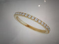 14 karat yellow gold 1/4 carat total Diamond weight. Natural earth ground French sets, anniversary band.